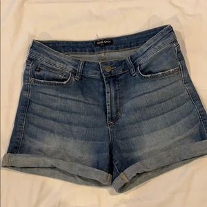 Cuffed shorts, stretchy. Very comfortable